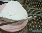 A picture of step 5 of 3 color cream cake.
