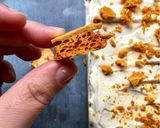 A picture of step 2 of No-churn honey ice cream with honeycomb crunch.