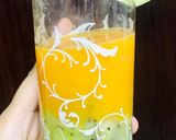 A picture of step 2 of Refreshing orange kiwi mocktail.