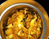 A picture of step 6 of Yam porridge with dryfish and cabbage.