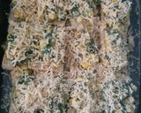A picture of step 4 of Khari biscuit with white sauce topping.