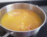 Foto del paso 3 de la receta: Arroz con bonito, ajetes y espárragos