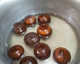 A picture of step 12 of Gullab gamoon.