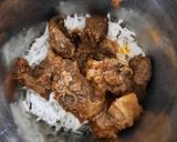 A picture of step 2 of Mutton Kebab with leftover meat and rice.