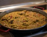 A picture of step 7 of Chicken Paella with Peppers.