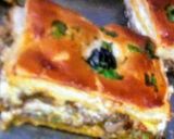 صورة لخطوة 2 من وصفة كوكا بالعجينة المورقة بحشو لذيذة😋