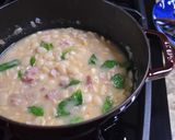 A picture of step 4 of Baby Lima Beans with Ham and Greens.