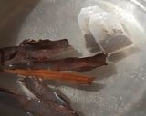 Foto del paso 2 de la receta: Cóctel de té negro con especias y naranja
