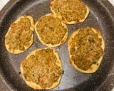 A picture of step 4 of Sfiha with Tomato and Tahini.