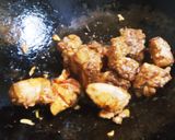 A picture of step 4 of Muamba De Galinha.