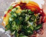 A picture of step 4 of Slight Spice Egg and Tuna Rice Bowl.