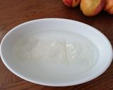 Foto del passaggio 6 della ricetta Cheesecake alle pesche