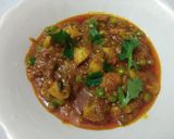 A picture of step 8 of Mushroom Matar (peas) Masala.