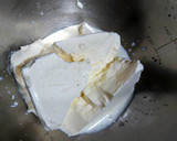 A picture of step 3 of Oreo cheese cake.