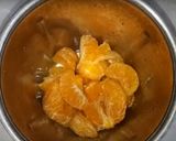A picture of step 1 of Orange & cucumber cooler.