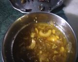 A picture of step 2 of Cauliflower curry with white gravy.