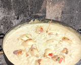 Foto del paso 10 de la receta: Calamares rellenos en salsa de mariscos a la crema