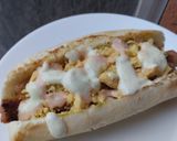 Foto del paso 8 de la receta: Perritos🧀calientes🍍a mi estilo🥯🌭
