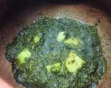A picture of step 10 of Alu palak.