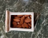 Foto del passaggio 6 della ricetta Tartufini al caffè e mascarpone con smarties colorati al cioccolato