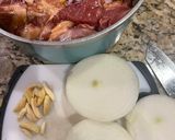 A picture of step 2 of Braised Pork with Tomato Sauce.