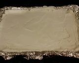 A picture of step 16 of Coconut Cream Pie Bars.