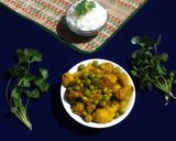 A picture of step 6 of Gobhi Matar Curry.