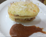 Foto del paso 12 de la receta: Milhojas de patatas con pollo 🐓 al horno y vino en reducción de su propio jugo