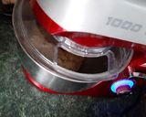 Briós (csokikrémmel, dióval és cukorral szórva) recept fázis 3 fotója
