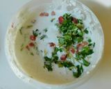 A picture of step 5 of Idli with oats and veggies, sambar.