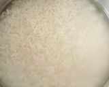 A picture of step 1 of Coconut Milk Rice.