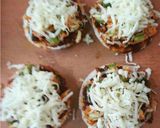 A picture of step 7 of Idlizza (Idli Pizza).