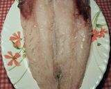 Foto del paso 9 de la receta Merluza del pincho al horno, con patatas y ajos