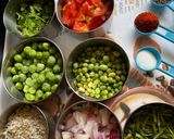 A picture of step 1 of Green tur and peas curry.