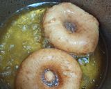 A picture of step 8 of Coconuts doughnuts.