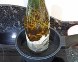 Foto del paso 1 de la receta Aceite de oliva infusionado con hierbas y ajos