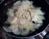 Foto del paso 12 de la receta: Tortilla de patatas con echalotes francesas confitadas