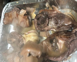 Foto del paso 7 de la receta: Paletilla de cordero al horno con cabeza de ajos y patata al horno