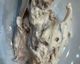 A picture of step 6 of Cook every part - Chicken broth (with some meat) from chicken back/carcass, and wing tips.