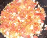 Foto del paso 2 de la receta: Enrollado a la pizza relleno con jamón, queso y tomate