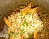 A picture of step 9 of Mince meat and egg jallof rice.