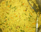 A picture of step 9 of Fried rice with peppered chicken dressed with cucumber.