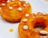 A picture of step 10 of Orange Glaze doughnut.