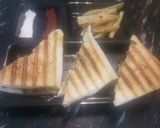 A picture of step 6 of Spinach corn cheese sandwitch.