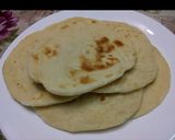 A picture of step 5 of Arabic shawarma wrap.