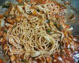 A picture of step 6 of American chopsuey with fried rice.