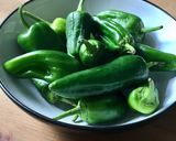 A picture of step 2 of Charred Padron Chilli Peppers.