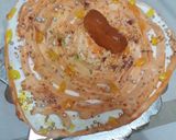 A picture of step 3 of Eggless rose cake.