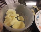 Foto del paso 2 de la receta: Pollo al parrigas con milhojas de papa