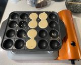 A picture of step 3 of Takoyaki (octopus balls).